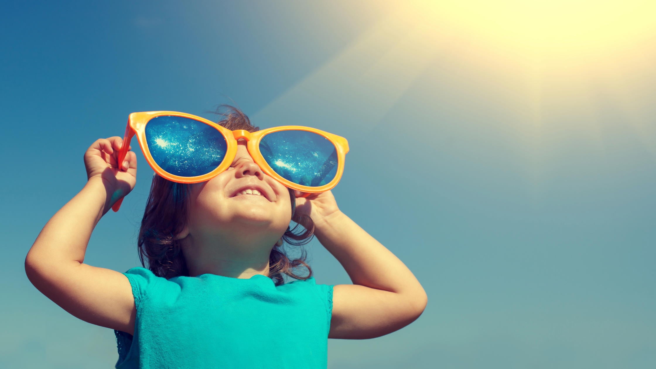 Texas child during sunny, hot, summer Texas day